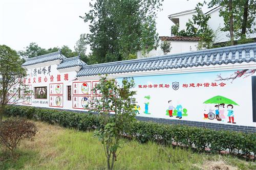 E:\10月20日1234正常\20日四版\裕安民生建成的乡村文化墙.JPG